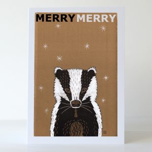 Badger in the snow festive greetings card, illustrated by Marianne Hazlewood, with Merry Merry on the front, blank inside