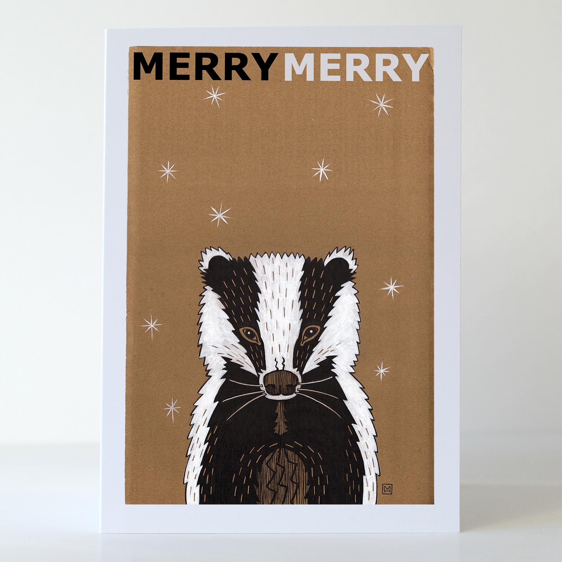 Badger in the snow festive greetings card, illustrated by Marianne Hazlewood, with Merry Merry on the front, blank inside Badger in the snow festive greetings card, illustrated by Marianne Hazlewood, with Merry Merry on the front, blank inside