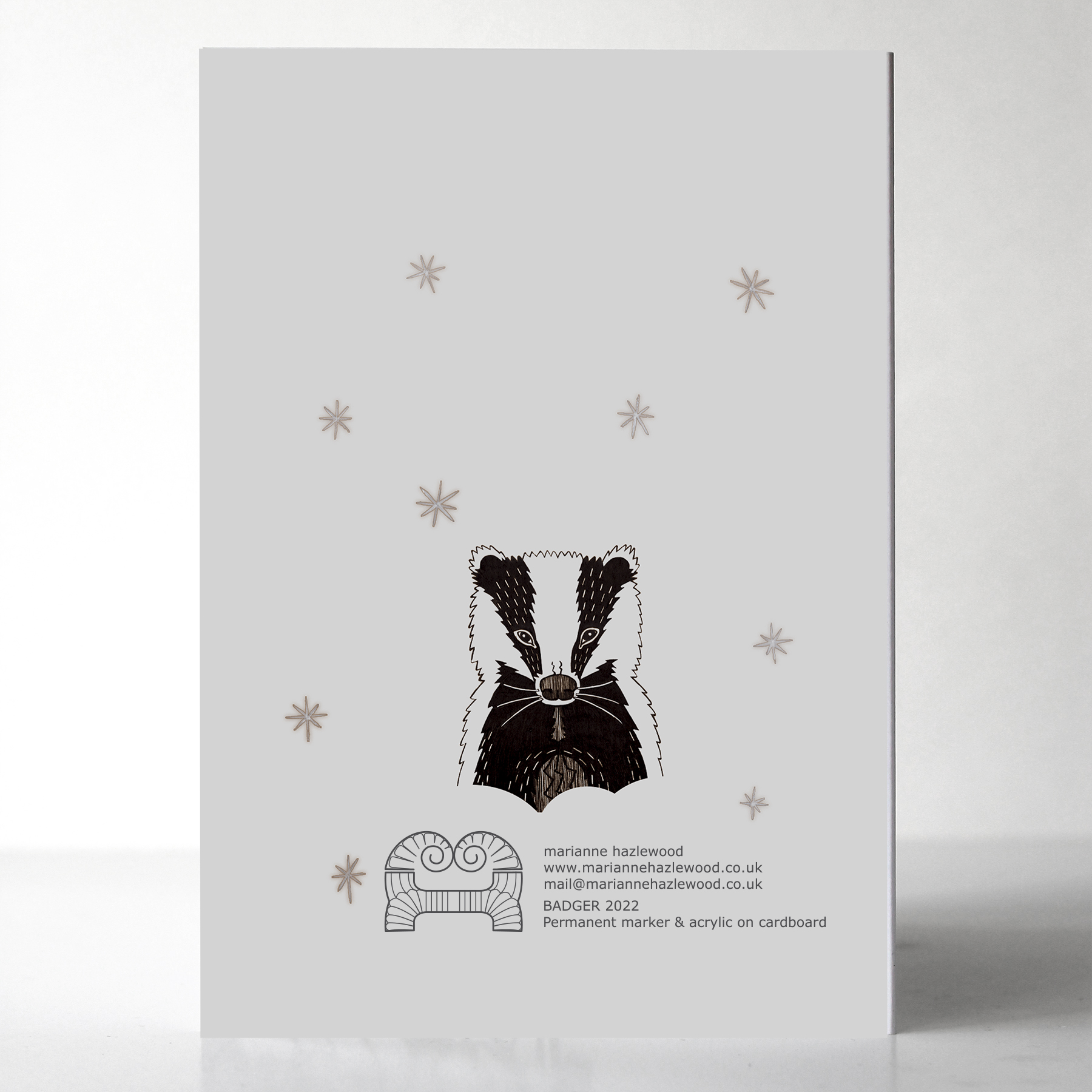 Badger in the snow festive greetings card, illustrated by Marianne Hazlewood, with Merry Merry on the front, blank inside Badger in the snow festive greetings card, illustrated by Marianne Hazlewood, with Merry Merry on the front, blank inside